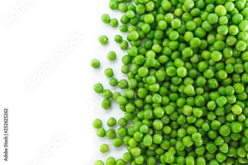 pile green peas on white background. photo