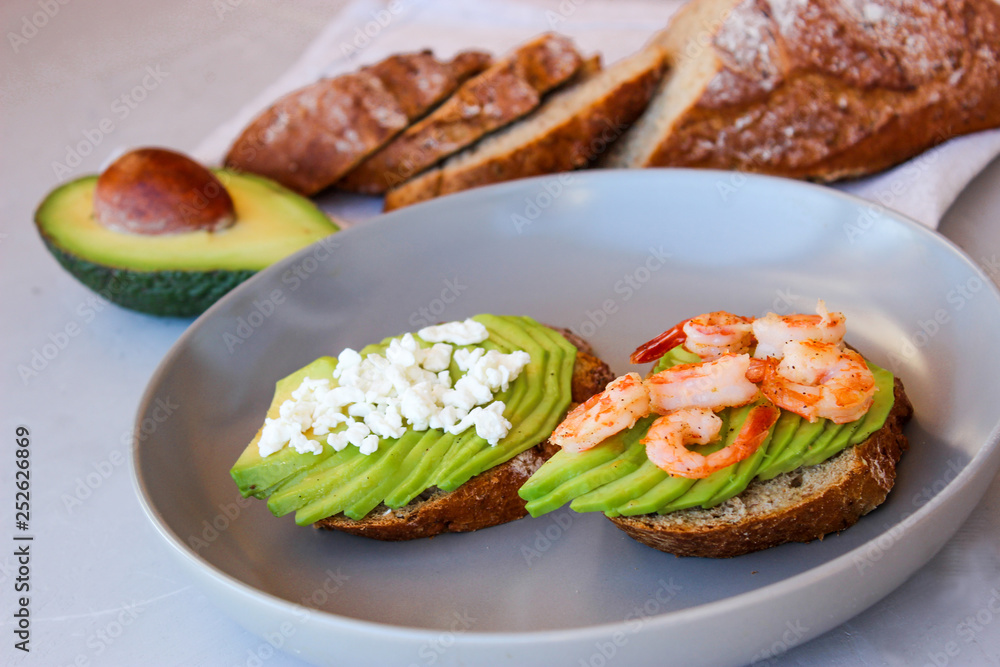 Healthy sandwiches with avocado and shrimp