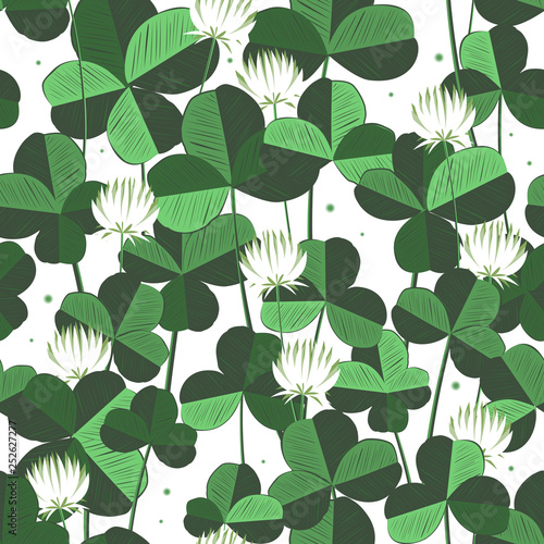 Vector floral seamless pattern with clover leaves and flowers. Saint Patricks day background with shamrock. Design with clover leaves for decor card  web site  wrapping  textile