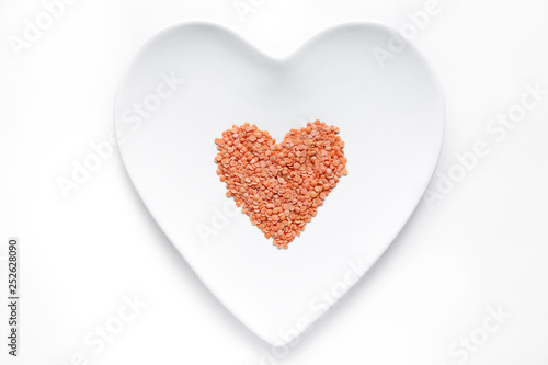 Persian Lentils lie in the shape of a heart on a white plate
