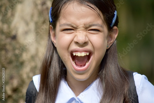 Mad Minority Female Student With Notebooks