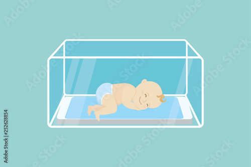 Little newborn baby in incubator box,medical and health care concept,