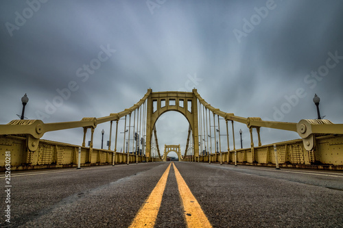 Yellow suspension bridge in Pittsburgh Pennsylvania. 