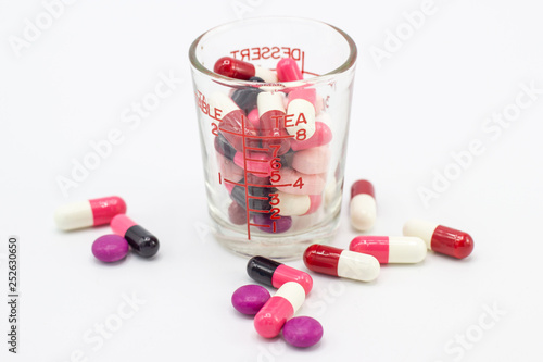 the pile of pills and capsules white background concept Health