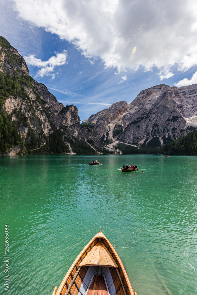 amazing view of turquoise Lago di Braies Lake or Pragser Wildsee in Dolomite mountains , Italy