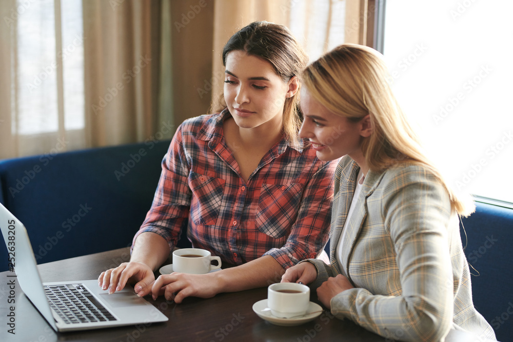 Girls in front of laptop Girls in front of laptop