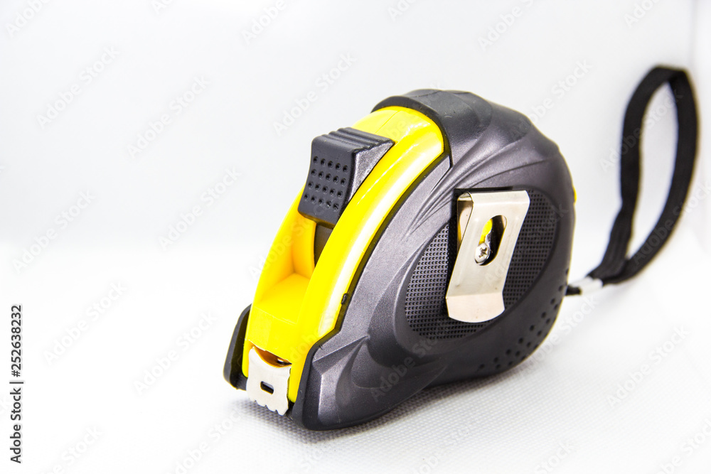 construction tool measuring tape on white background construction tool measuring tape on white background