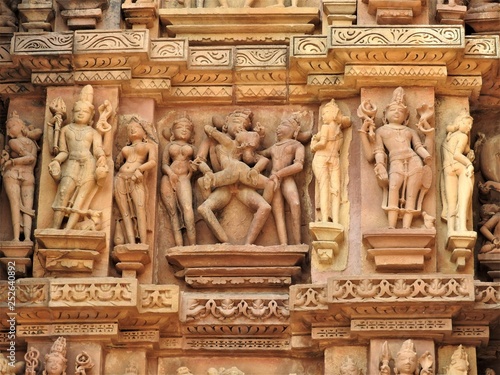 Sex poses from the kamasutra, erotic close - up of intricate carved scenes on the walls of Hindu temples in the Western group of Khajuraho, India