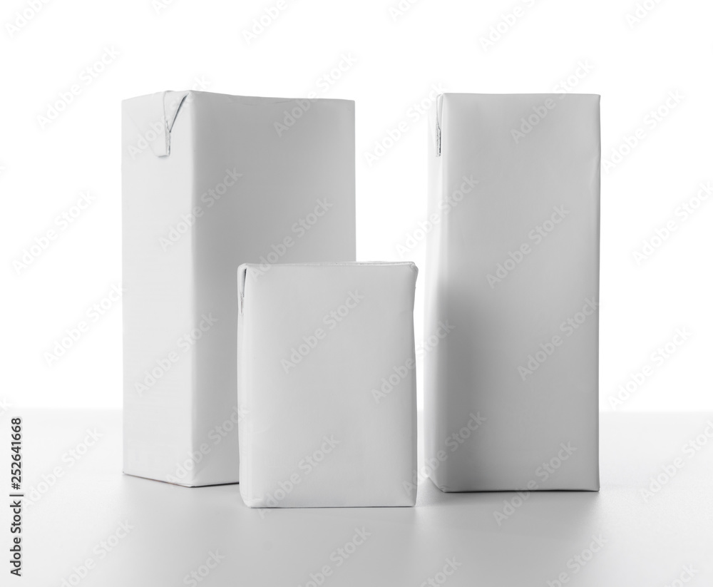 Blank milk or juice carton boxes on white background for print design and mock up Blank milk or juice carton boxes on white background for print design and mock up