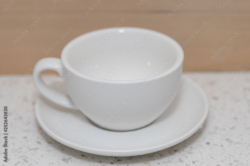 White coffee cup on the table - - Image White coffee cup on the table - - Image