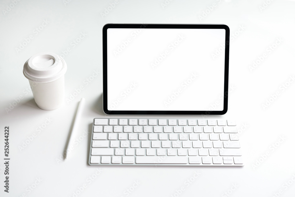 Tablet screen blank on the table mock up to promote your products. Concept of future and trend internet for easy access to information. Tablet screen blank on the table mock up to promote your products. Concept of future and trend internet for easy access to information.