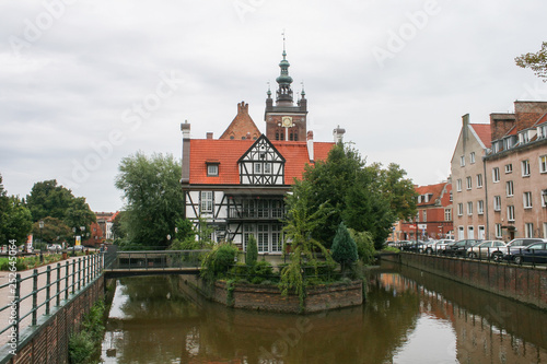 A house is surrounded by water. Bridges, channels, river, houses, street and park. © Олег Дашковець