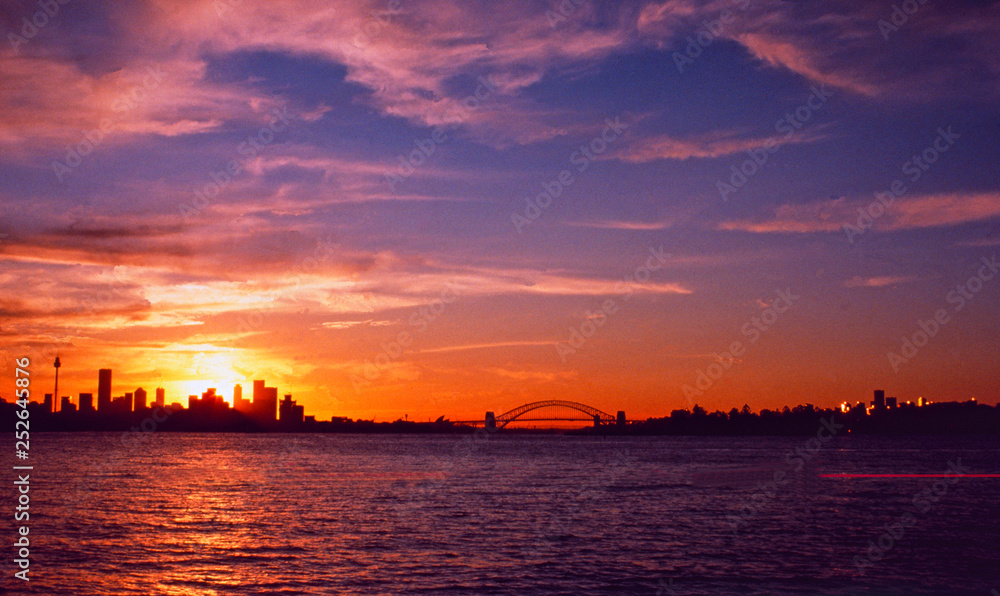 Australia: Sydney's Skyline and harbour bridge at sunset from a cruise ship