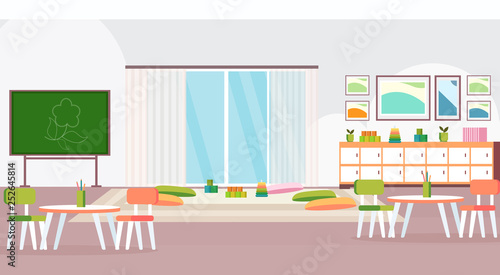 preschool modern kindergarten children classroom with chalkboard desks chairs and playroom decoration furniture empty no people kid room interior flat horizontal