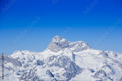 Panoramic view of the snowy mountain Triglav the highest peak of Slovenia