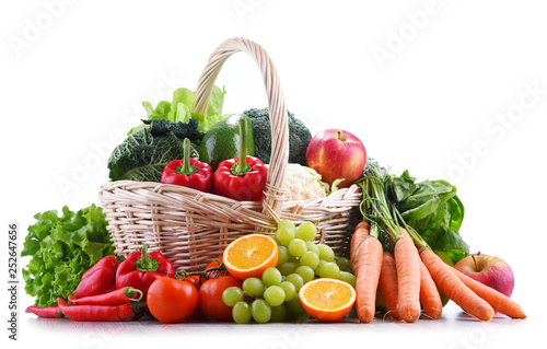 Fototapeta Naklejka Na Ścianę i Meble -  Fresh organic fruits and vegetables in wicker basket
