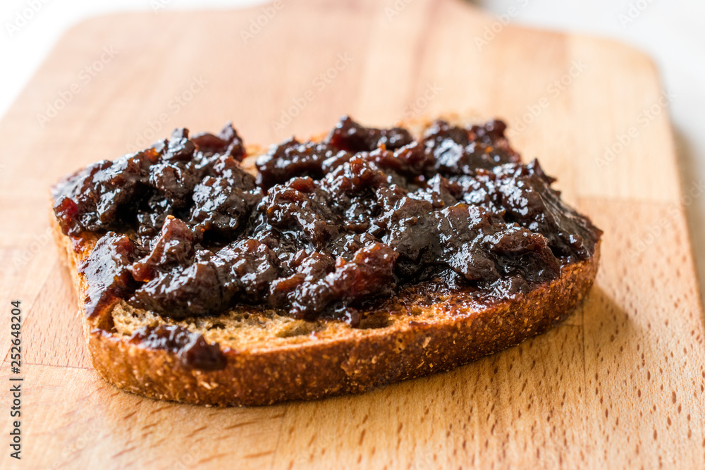 Organic Apple Molasses / Raw Fruit Paste Jam with Bread. Organic Apple Molasses / Raw Fruit Paste Jam with Bread.
