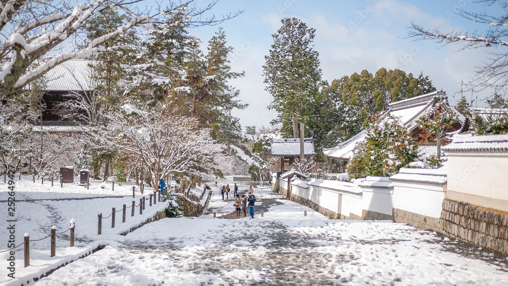 Landscape photo of the beautiful winter scene seen in Kyoto City's Nanzenji Temple in Japan after a rare heavy snowfall during a cold winter.