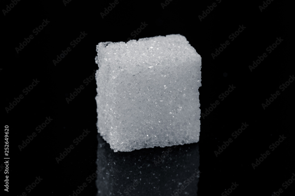 one single piece cube sugar on black background