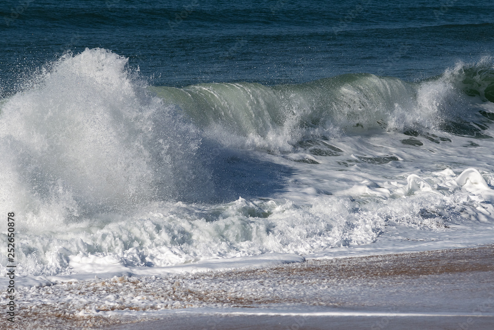 Fototapeta premium Foamy Atlantic ocean water, Portugal coast.