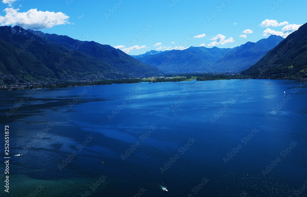 Paragliding above Lago Maggiore Delta viewing the Magadino valley