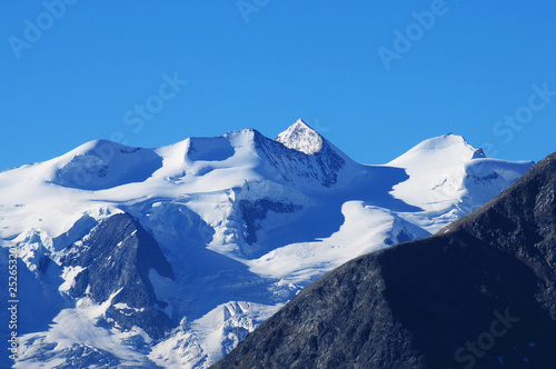 Swiss alps: View from Muotas Muragl to the Bernina mountain range and melting glaciers photo