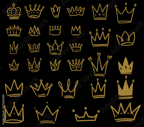 Set of hand drawn crown icons on dark background. Design element for logo, label, sign, poster, card.