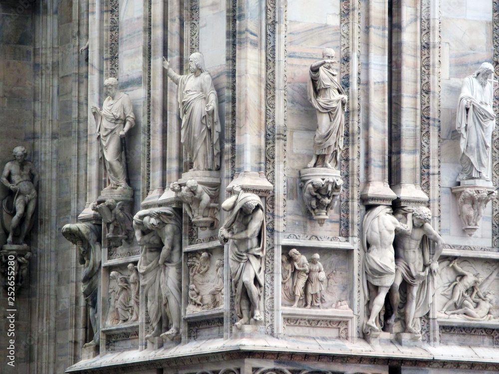 The famous Cathedral of Milan (Italian: Duomo di Milano), the Cathedral of the Nativity of the Virgin. Details of the church close-up. Lombardy, Italy