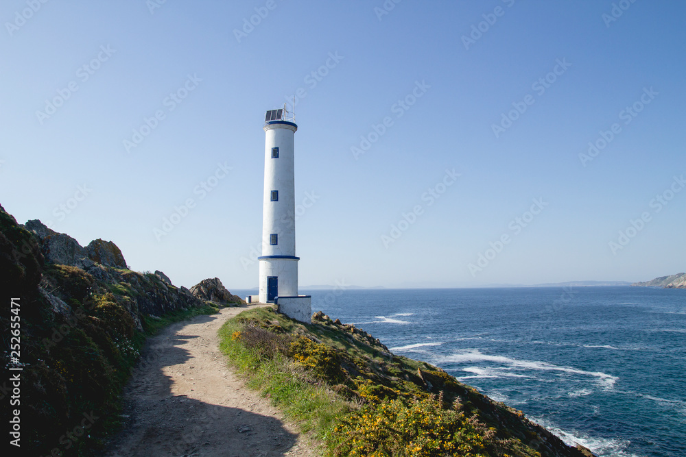 Old lighthouse in galician coastline