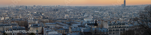 Paris, France - 02 24 2019: Montmartre at sunset. Wonderful panoramic view of Paris from sacred heart