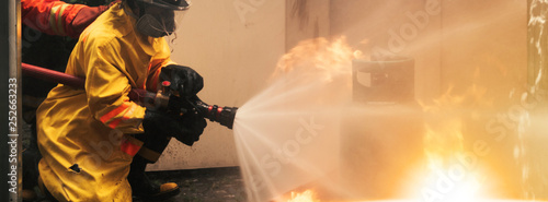 Fotografija Blurred Fire Fighting and Evacuation Simulation For Safety in Emergency Situatio