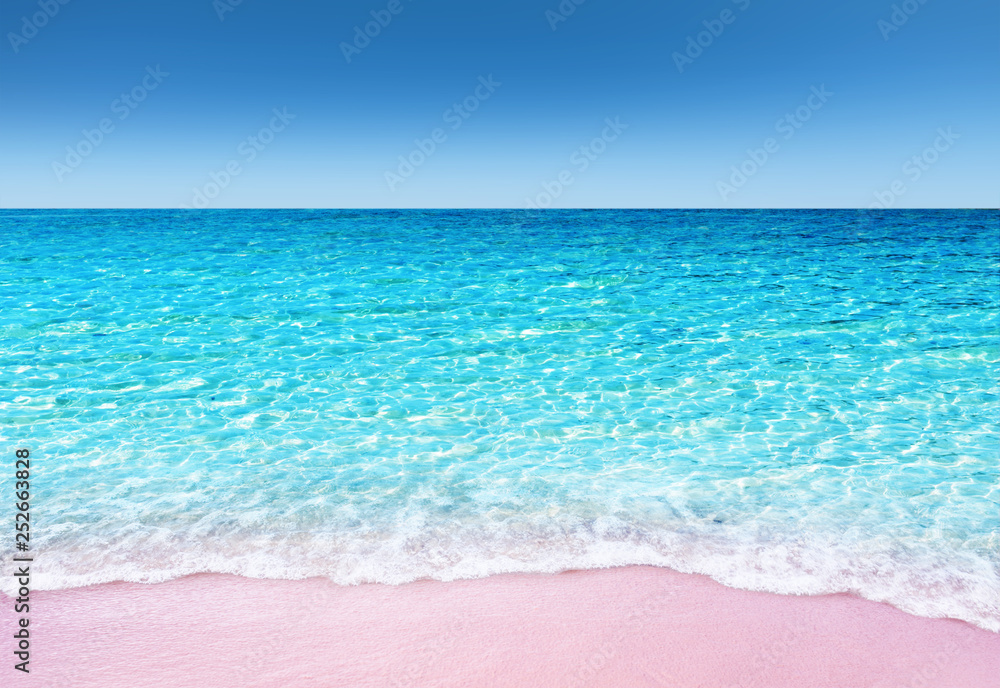 Obraz premium Soft blue ocean wave with tropical pink sandy beach