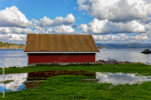 A typical house of the fishermen on the beach in Stavanger, Norway. photo