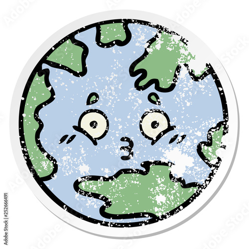 distressed sticker of a cute cartoon planet earth