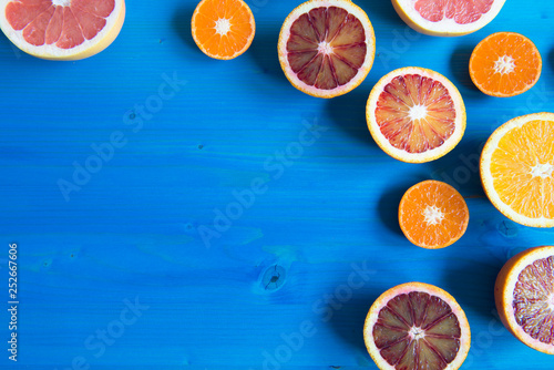 Orange, Blood orange, grapefruit and tangerines, fruit on the blue wooden table