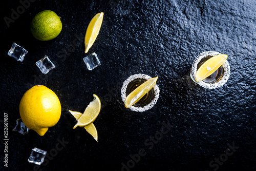 Tequila with lemon and lime