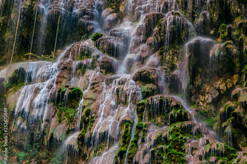 Waterfall outside a grotto