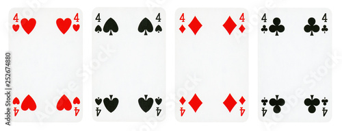 Four Playing Cards Isolated on White Background, Showing Four from Each Suit - Hearts, Clubs, Spades and Diamonds. photo