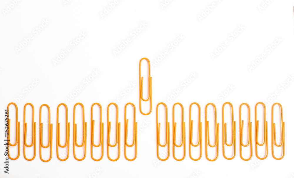 Paper clips isolated one stood out first - obrazy, fototapety, plakaty 