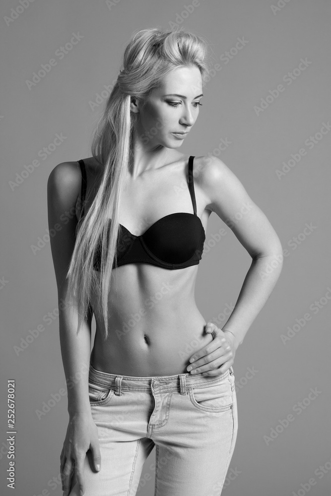 Fototapeta premium Young sexy girl on black and white photo