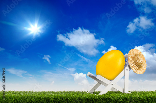 Obraz na plátne easter egg on deck chair sun lounger in garden abstract funny concept  blue sky