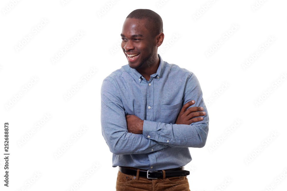handsome young african american man smiling with arms crossed by white background handsome young african american man smiling with arms crossed by white background