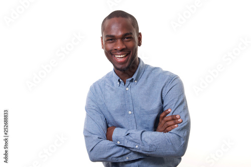happy young african businessman laughing against isolated white background