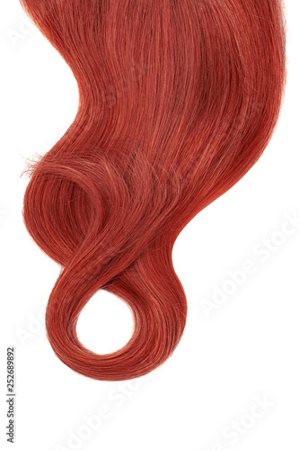 Long beautiful red hair in shape of numeral eight, isolated on white background