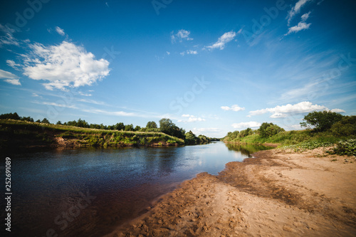 Typical summer landscape of a small river