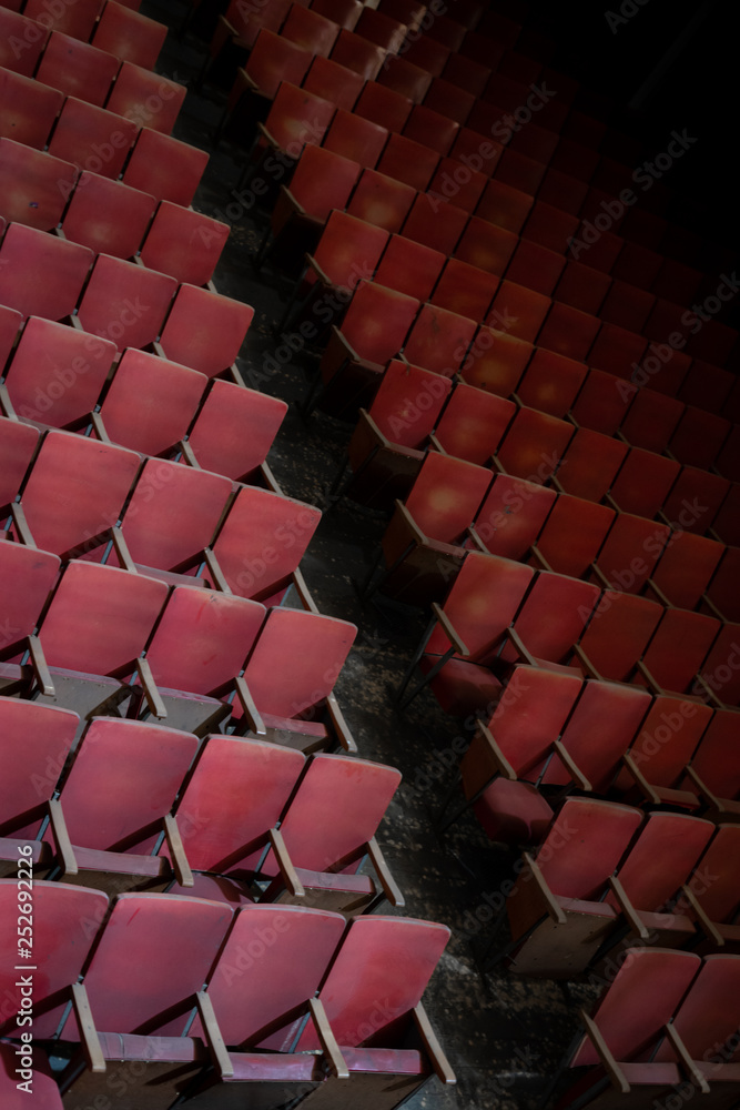 Rows of seats in an old theater Rows of seats in an old theater