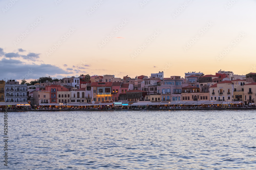 The city of Chania is a port on the west coast of the Cretan Sea in Greece. A tourist attraction, a long quay, interesting architecture. The Mediterranean Sea. A wonderful summer day for relaxation.