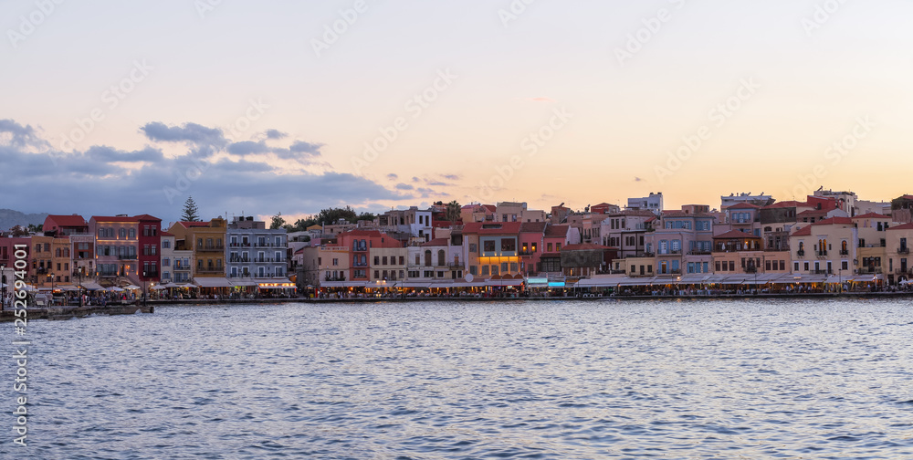 The city of Chania is a port on the west coast of the Cretan Sea in Greece. A tourist attraction, a long quay, interesting architecture. The Mediterranean Sea. A wonderful summer day for relaxation.