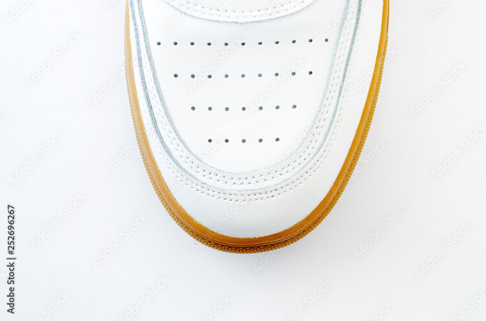 Fototapeta premium White sneakers with white background