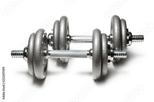 Metal dumbbells for fitness with chrome silver handle isolated on white